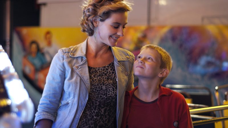 Foto Der Junge mit dem Fahrrad