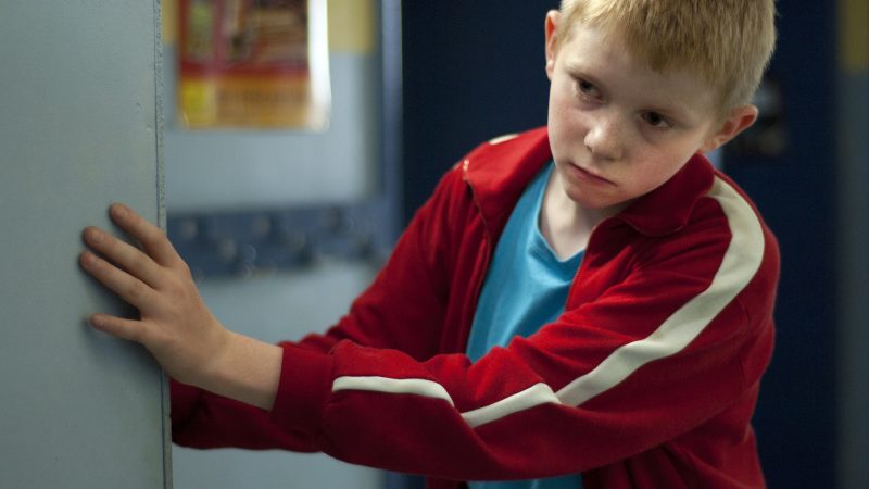 Foto Der Junge mit dem Fahrrad